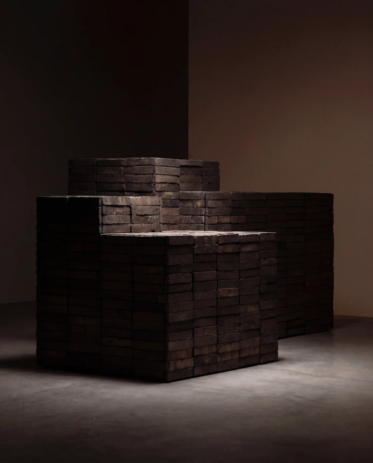 The black brick plinths of the TERRA installation at The Conran Shop in London.
