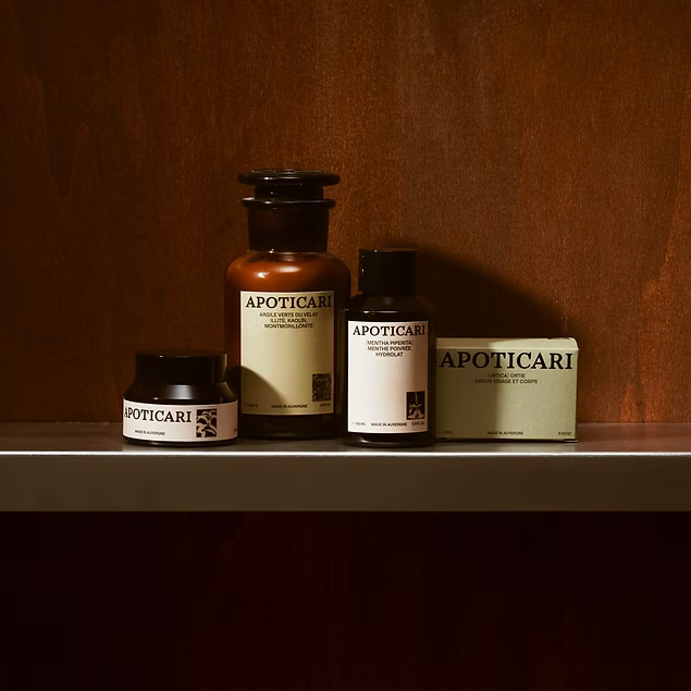 Peppermint hydrosol, Velay clay, Apoticari cream and soap on a shelf.